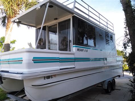 The beam length is 8. . Lil hobo houseboat for sale